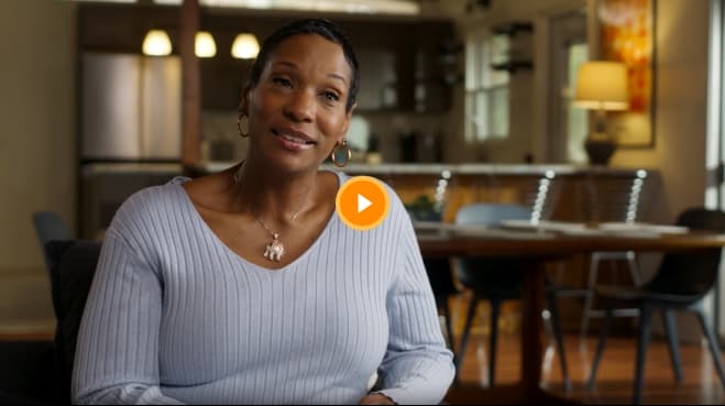 Video thumbnail of a woman smiling indoors.