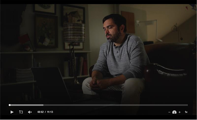A man sitting in a couch
